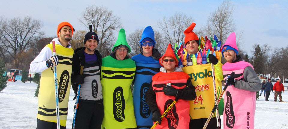 People dressed like a box of crayons
